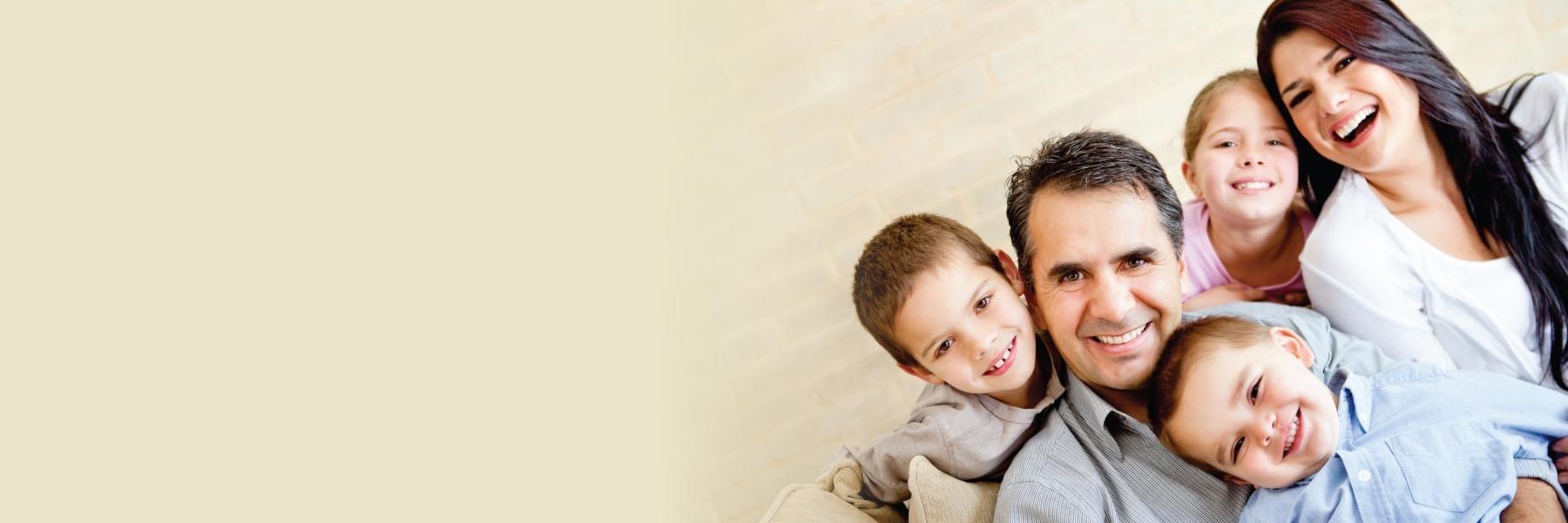 Family of general dentistry patients smiling in Eagan, MN